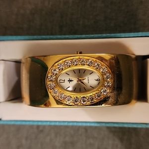 CATO Gold Tone Rhinestone Cuff Watch women’s with rhinestones